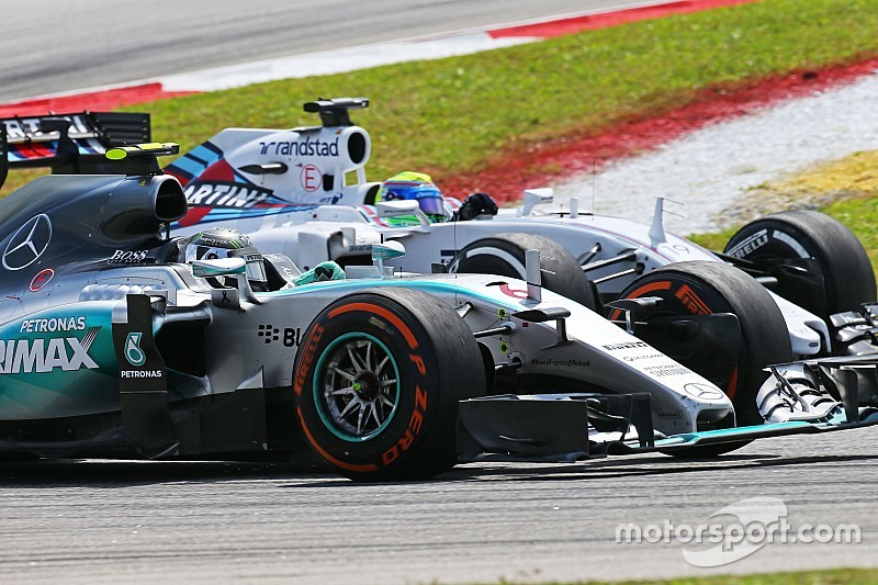 Nico Rosberg, Mercedes AMG F1 W06 and Felipe Massa, Williams FW37 battle for position