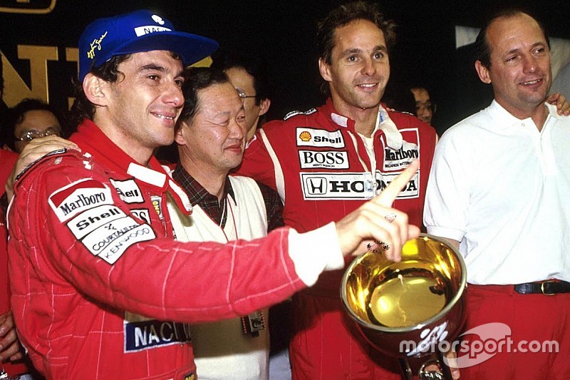 1991 World Champion Ayrton Senna, race winner Gerhard Berger, McLaren CEO Ron Dennis