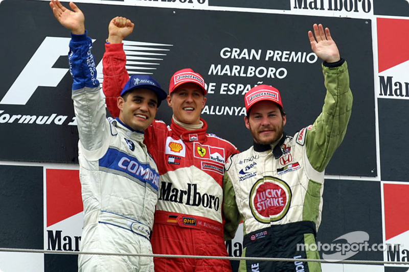 The podium: Juan Pablo Montoya, Michael Schumacher and Jacques Villeneuve