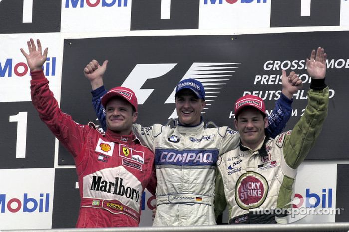 Pódio da corrida, com Ralf, Rubinho e Jacques VIlleneuve, em sua última aparição no top-3 na F1.