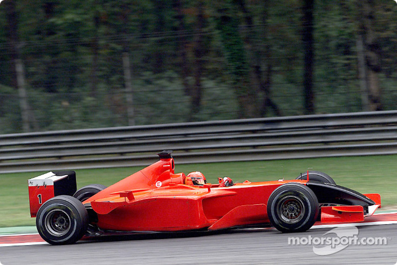 Michael Schumacher driving the Ferrari with no sponsor and a black nose