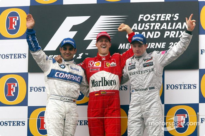 Juan Pablo Montoya, Michael Schumacher y Kimi Räikkönen en el podio de Melbourne en 2002