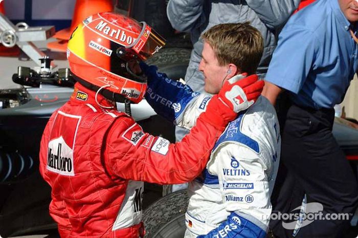 El ganador de la carrera, Michael Schumacher y su hermano Ralf