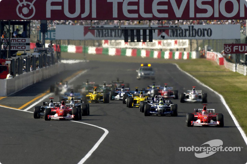 The start: Michael Schumacher takes the lead in front of Rubens Barrichello