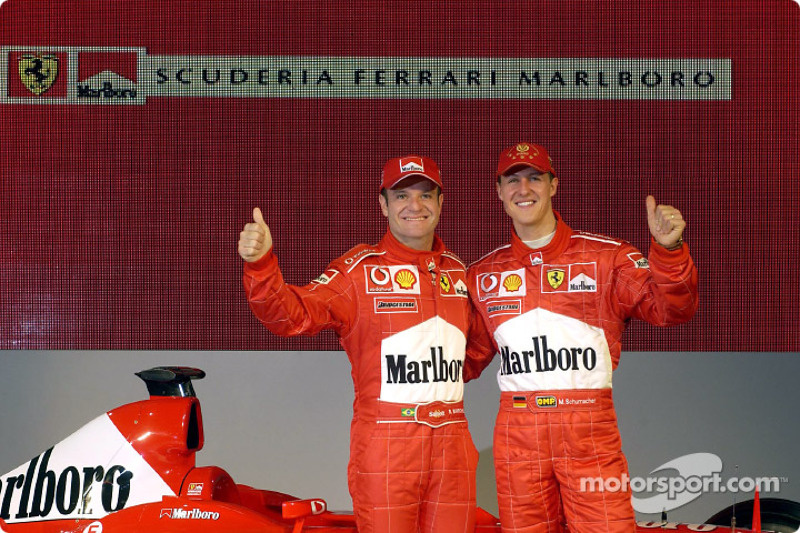 Michael Schumacher and Rubens Barrichello with the new Ferrari F2003-GA