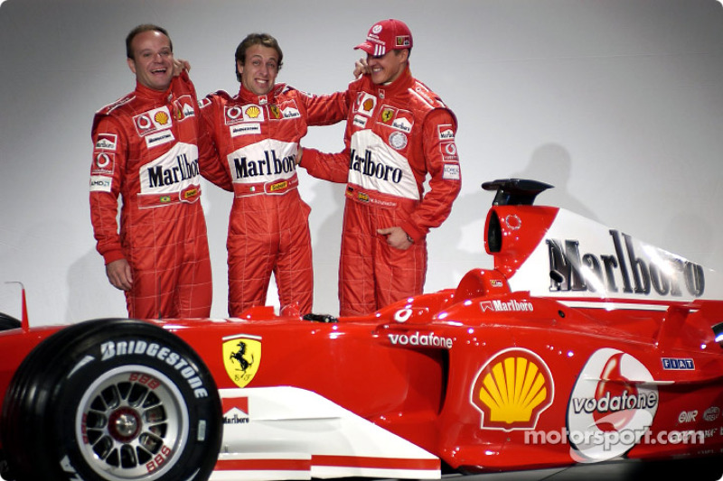 Rubens Barrichello, Luca Badoer and Michael Schumacher with the new Ferrari F2004