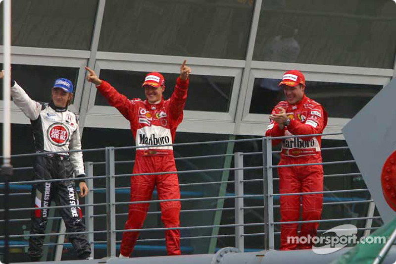 2004. Подіум: 1. Рубенс Баррікелло, Ferrari. 2. Міхаель Шумахер, Ferrari. 3. Дженсон Баттон, BAR-Honda