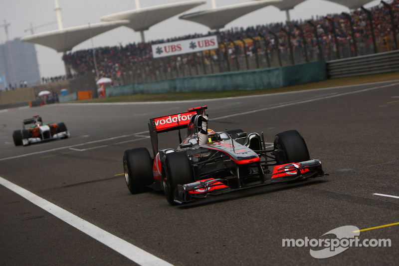 Lewis Hamilton, McLaren Mercedes takes checkered flag