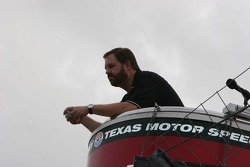 Eddie Gossage watches the pre-race activites from the flag stand