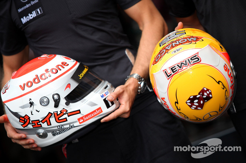 Jenson Button, McLaren Mercedes and Lewis Hamilton, McLaren Mercedes with Steinmetz Diamonds on their helmets