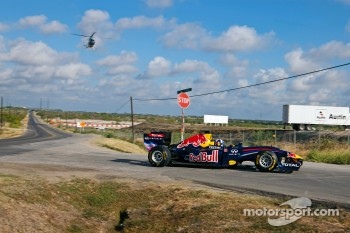 David Coulthard drives the Red Bull F1 car on the Circuit of the Americas in construction