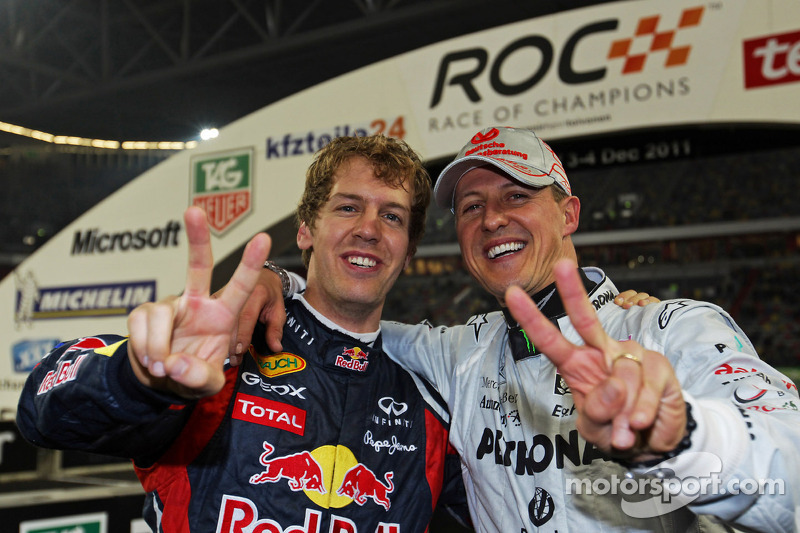 Winners Sebastian Vettel and Michael Schumacher