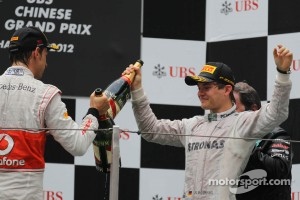 Jenson Button, McLaren Mercedes and Nico Rosberg, Mercedes AMG Petronas