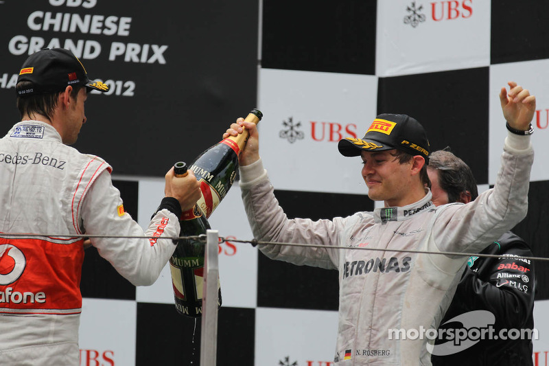 Jenson Button, McLaren Mercedes y Nico Rosberg, Mercedes AMG Petronas