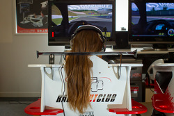 Cyndie Allemann in a racing simulator