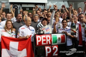 Second place Sergio Perez, Sauber F1 Team celebrates with the team and Peter Sauber, Sauber Team Principal