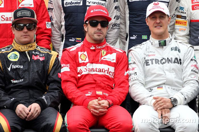 Kimi Raikkonen, Lotus F1 Team, Fernando Alonso, Scuderia Ferrari, y Michael Schumacher, Mercedes GP