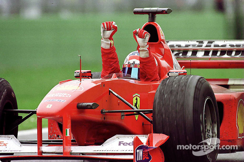 Race winner Michael Schumacher celebrates