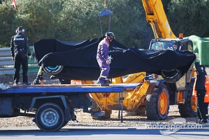 The Mercedes AMG F1 W04 of Lewis Hamilton recovered back to the pits on the back of a truck