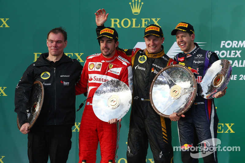 The podium, Renault Race Engineer; Fernando Alonso, Ferrari, second; Jenson Button, McLaren, race winner; Fernando Alonso, Ferrari, third