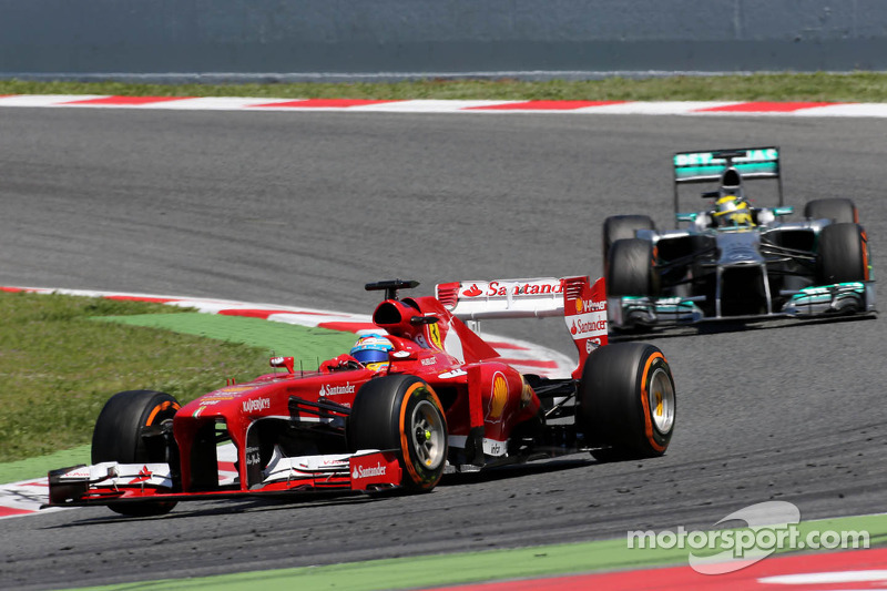 Фернандо Алонсо (Ferrari) та Ніко Росберг (Mercedes)