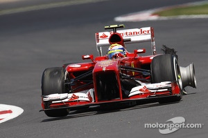 Felipe Massa Ferrari F138 with a rear Pirelli tyre puncture