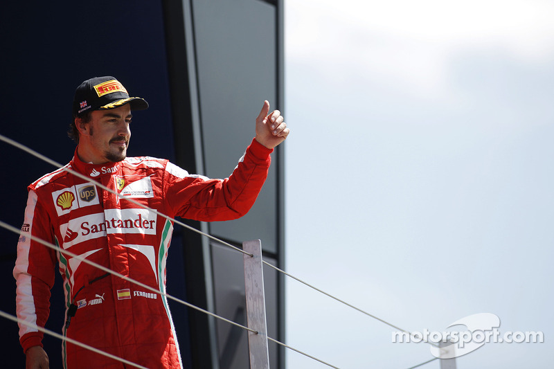 Fernando Alonso Ferrari celebrates his third position on the podium 