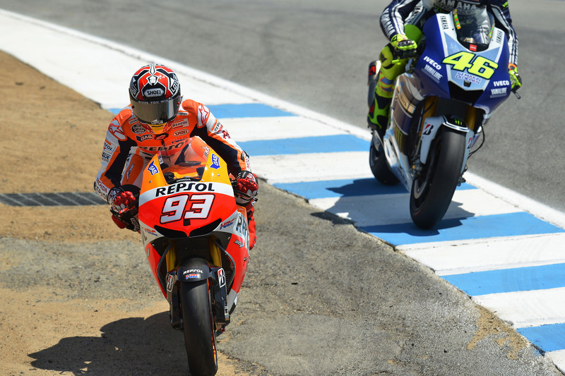 Marc Marquez, Repsol Honda Team passes Valentino Rossi, Yamaha Factory Racing