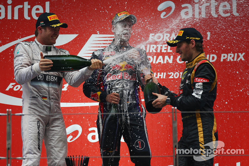 Podium: 1. Sebastian Vettel; 2. Nico Rosberg; 3. Romain Grosjean