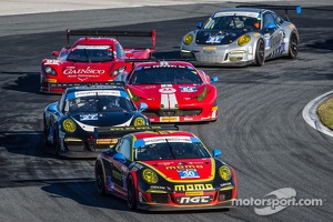 #30 NGT Motorsport Porsche 911 GT America: Henrique Cisneros, Christina Nielsen, Nicki Thiim, Kuba Giermaziak leads a group of cars