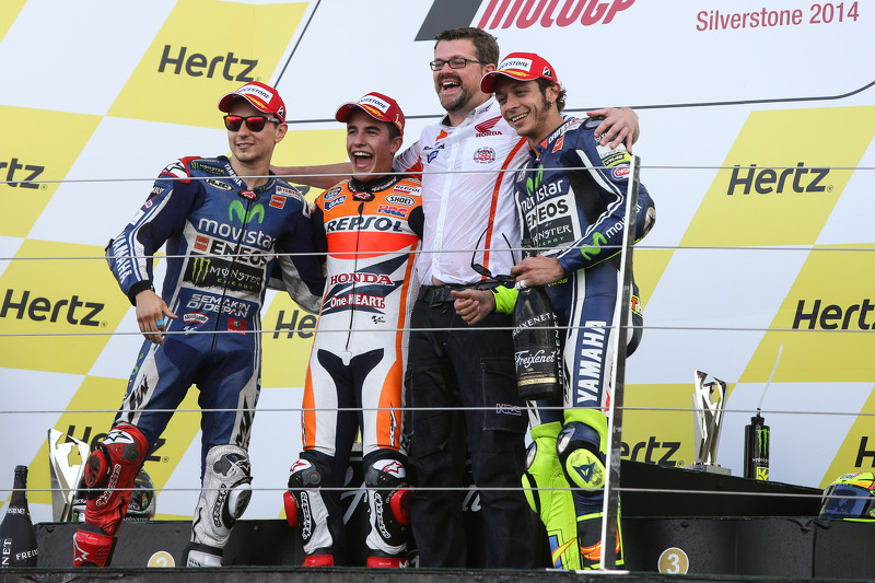 Podium: race winner Marc Marquez, second place Jorge Lorenzo, third place Valentino Rossi