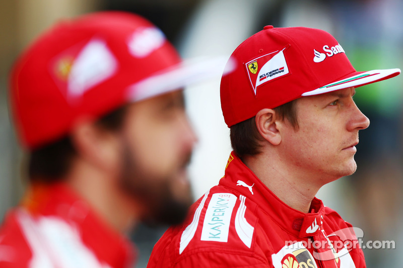 (L to R): Fernando Alonso, Ferrari and team mate Kimi Raikkonen, Ferrari at a team photograph