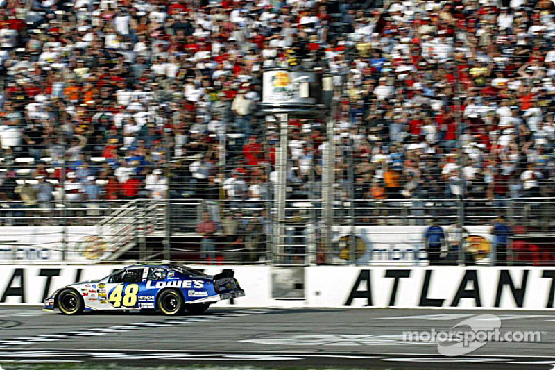 Jimmie Johnson takes the checkered flag