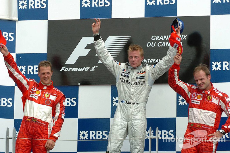 Podium: race winnaar Kimi Raikkonen met Michael Schumacher en Rubens Barrichello