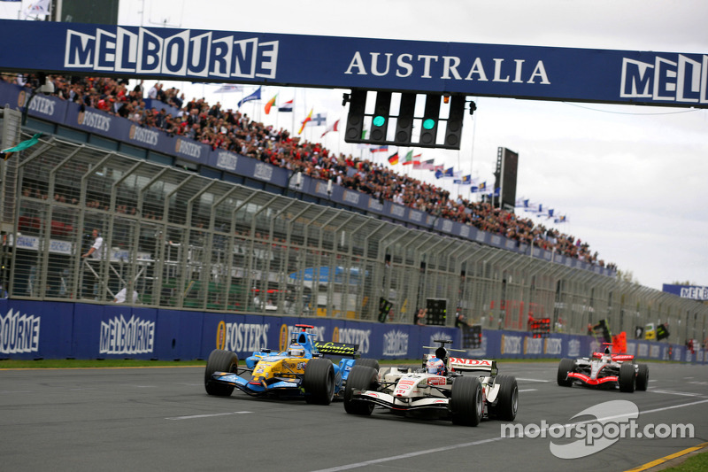 Fernando Alonso passes Jenson Button for the lead