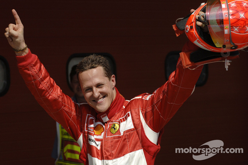 Pole winner Michael Schumacher celebrates