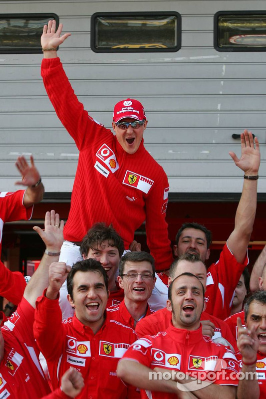 Race winner Michael Schumacher celebrates with his team at European GP
