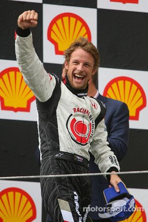 Podium: race winner Jenson Button celebrates