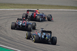 Daniil Kvyat, Red Bull Racing RB11 leads Daniel Ricciardo, Red Bull Racing RB11 and Fernando Alonso, McLaren MP4-30