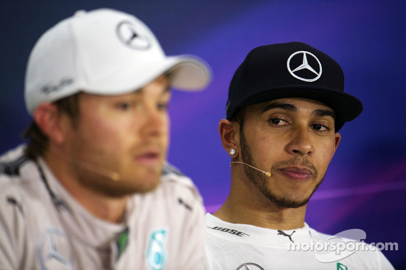 Nico Rosberg Mercedes AMG F1 and team mate Lewis Hamilton Mercedes AMG F1 in the FIA Press Conferenc