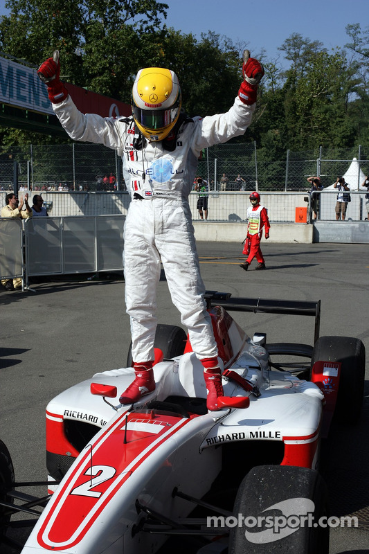 GP2 Series champion Lewis Hamilton celebrates at Monza