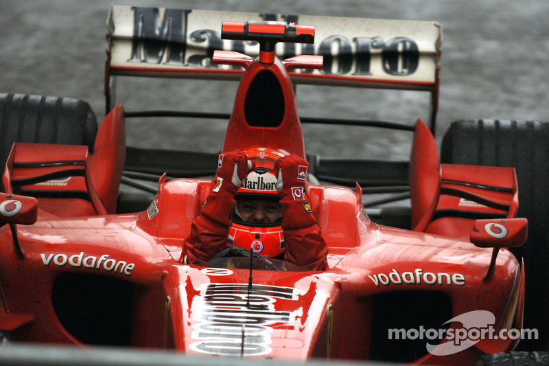 Race winner Michael Schumacher celebrates