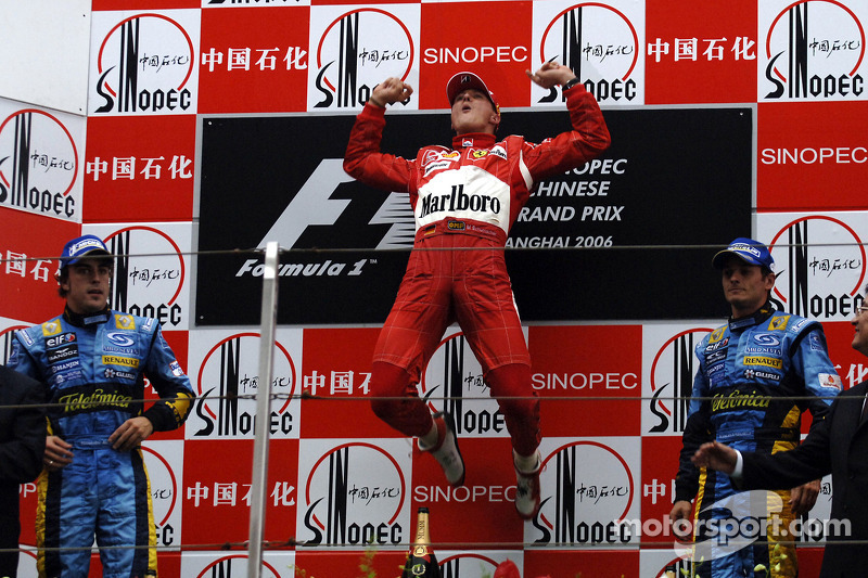 Podium: race winner Michael Schumacher with Fernando Alonso and Giancarlo Fisichella