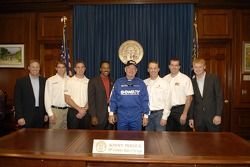 Rusty Wallace, David Ragan, Chase Miller, Bill Lester, Georgia governor Sonny Perdue, Kevin Harvick, Joey Clanton and Steve Wallace pose for a photo at the Georgia State Capitol