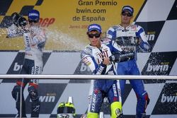 Podio: champagne para Dani Pedrosa, Valentino Rossi y Colin Edwards