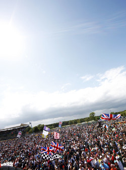 Fans invade the circuit at the podium