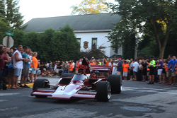 Race cars return to the track after the concours 1974 Lola T332