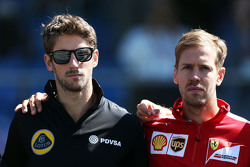 Romain Grosjean, Lotus F1 Team Sebastian Vettel, Ferrari