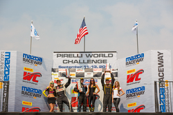 GTS Podium: Race winner #07 Scuderia Corsa Ferrari 458 GT3 Italia: Martin Fuentes, second place Buz McCall, and third place #32 Turner Motorsport BMW E89 Z4 GT3: Bret Curtis