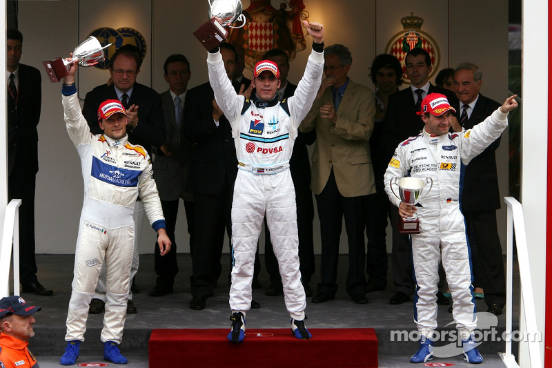 Podium: race winner Pastor Maldonado with Giorgio Pantano and Timo Glock